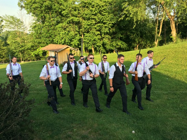Groomsmen with guns