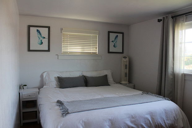 White bedroom with blue accents