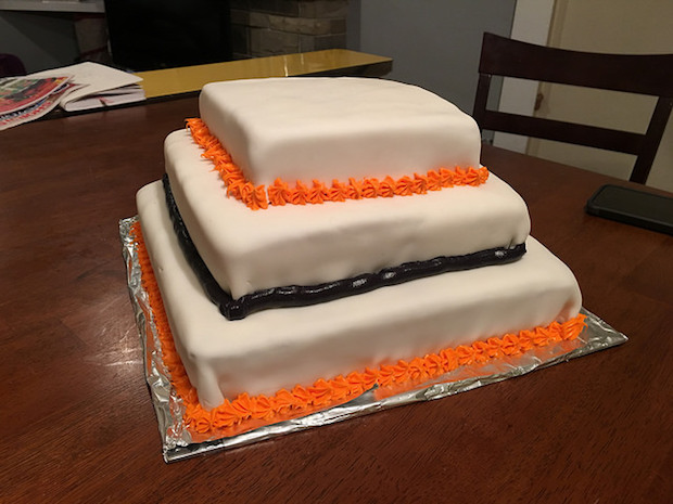 Three layer wedding cake with fondant and Harley Davidson colors
