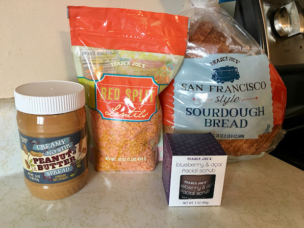Trader Joe's peanut butter, sourdough bread, red split lentils, and blueberry acai exfoliant 