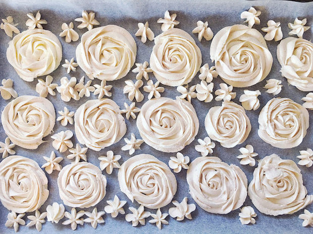 Whipped cream piped into flowers and frozen