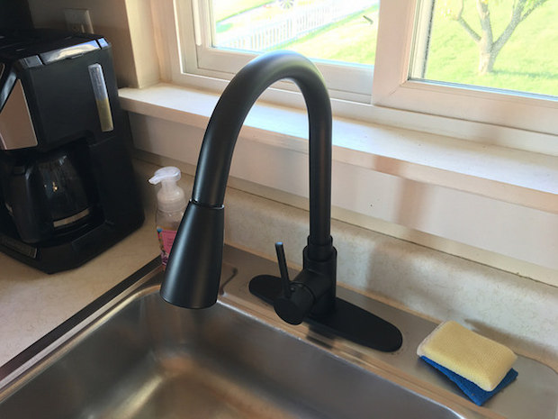 Matte black kitchen faucet with pull down sprayer