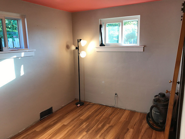 Baby girl nursery with coral pink and gray