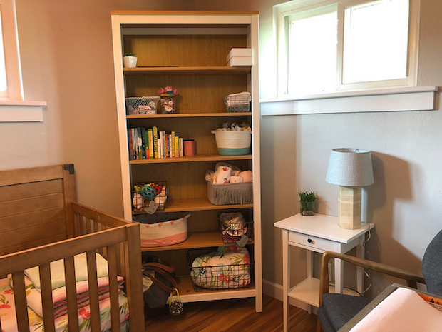 Baby girl bookshelf in nursery from Ikea