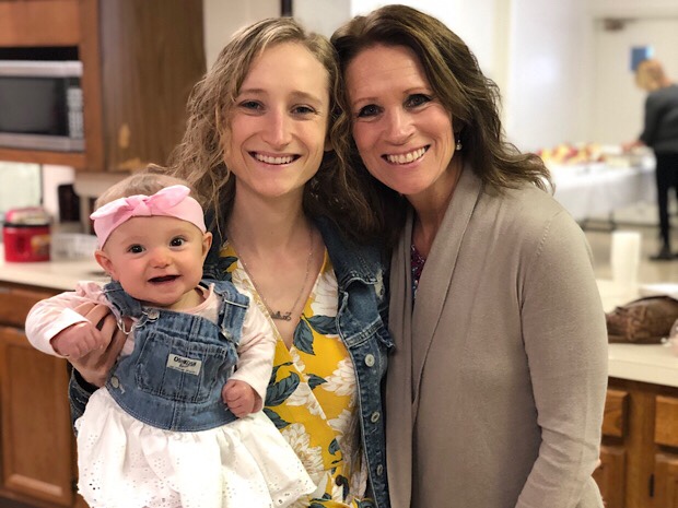 Three generations of women with baby
