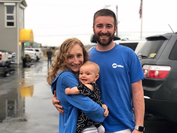 Husband and wife with baby girl in Outer Banks