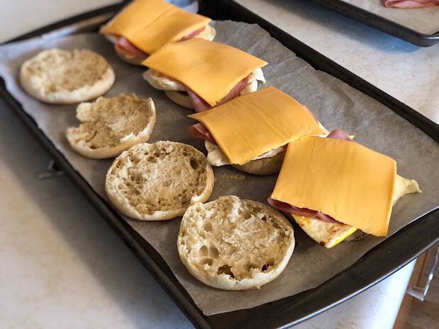 Egg and ham english muffin breakfast sandwiches