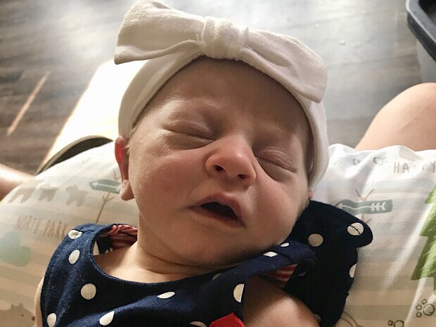 Baby girl with white headband