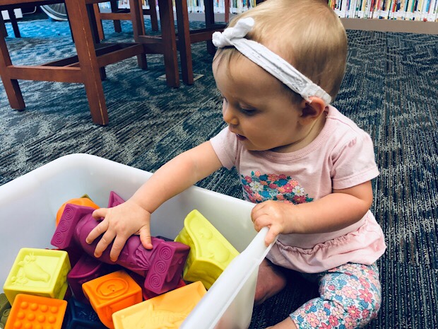 Baby playing with soft blocks