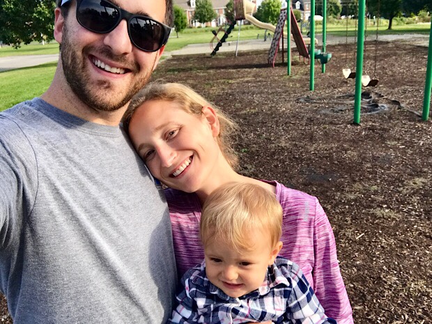 Mom and dad at park with baby girl