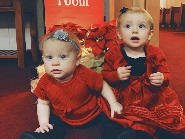 Baby girls in Christmas dresses