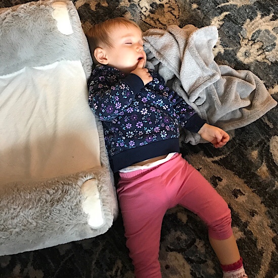 Baby sleeping on floor