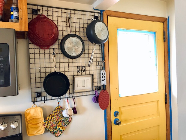 Rack to hang pots and pans in kitchen