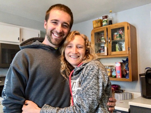 Husband and wife smiling