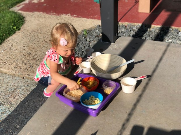 Toddler outdoor pouring station