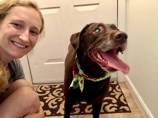 Girl with chocolate lab