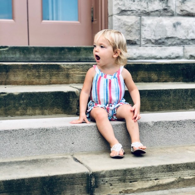 Toddler on library steps in Carnegie Pittsburgh Library