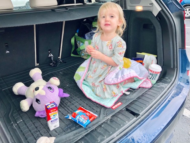 Toddler in back of car