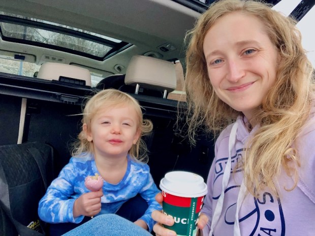 Mom and toddler with Starbucks