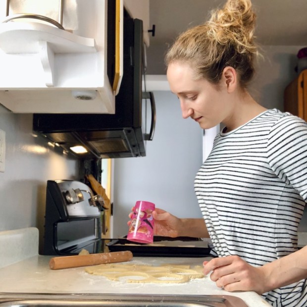 Girl making sugar cookies