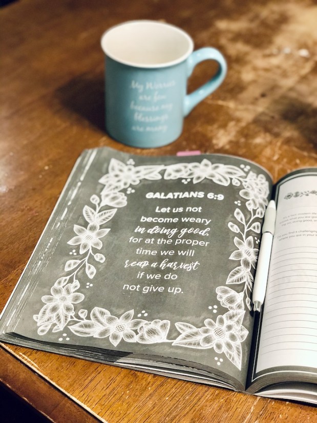 Prayer journal and coffee