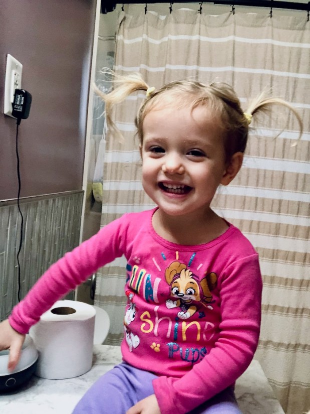 Toddler with pigtails