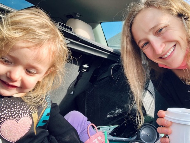 Mom and daughter with Starbucks coffee