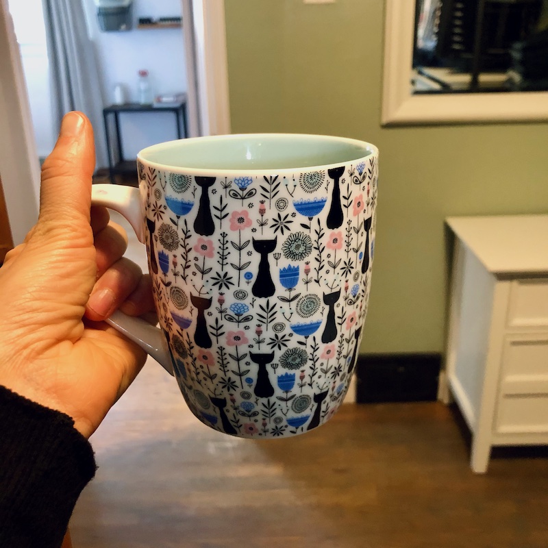 Black cat coffee mug by Mildred and Lily