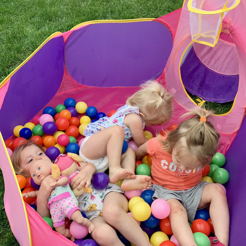 Toddlers playing in ball pit