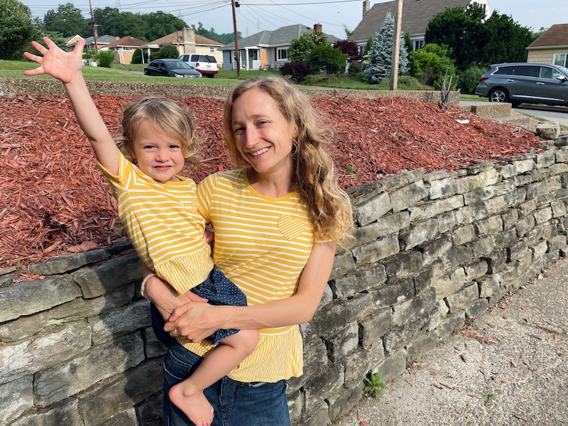 Mom and daughter wearing matching yellow shirts from Carter's
