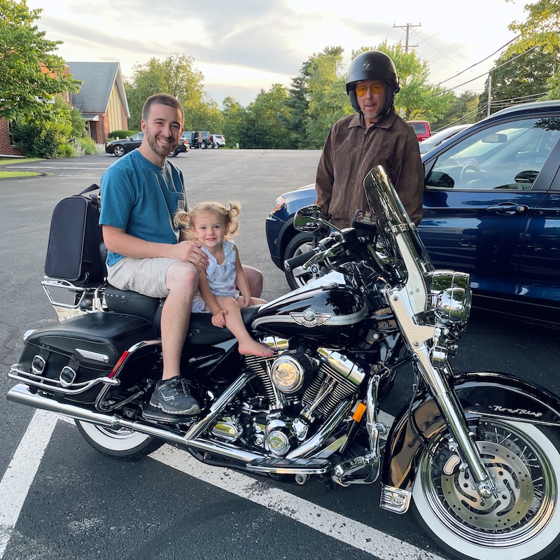 Father and toddler on motorcycle