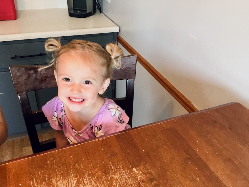 Toddler girl with pigtails