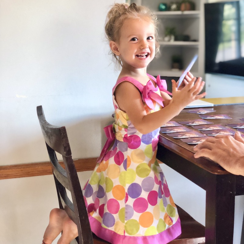 Toddler girl wearing dress with polka dots