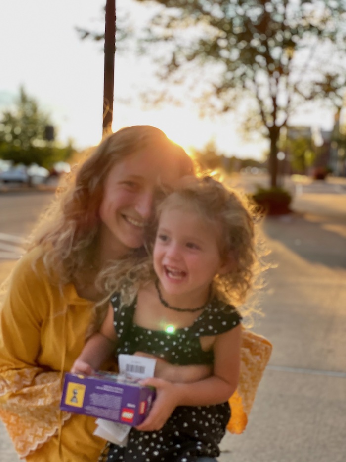 Mom and toddler daughter with LEGO kit