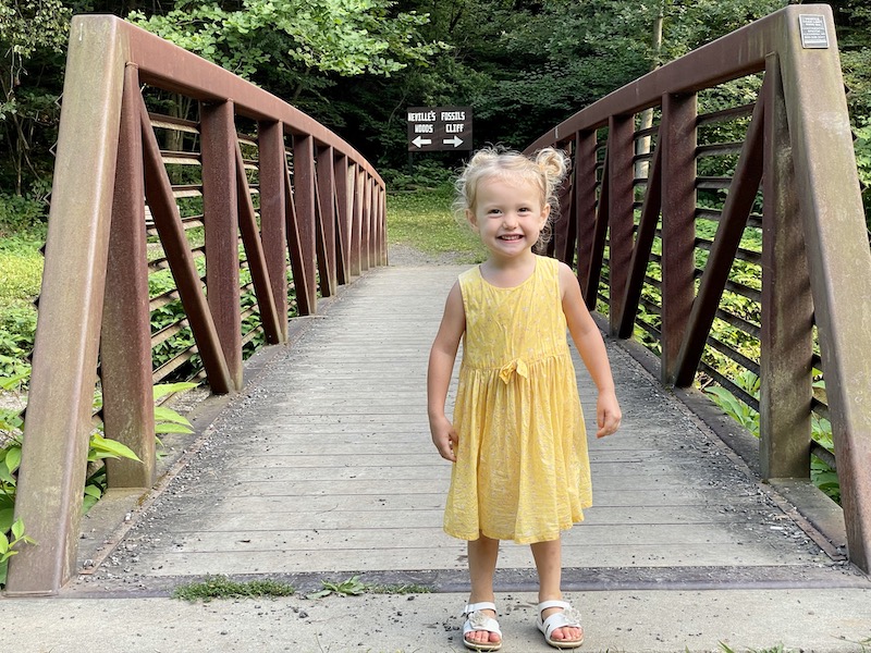 Toddler standing on bridge at Panhandle Trail in Pittsburgh, PA