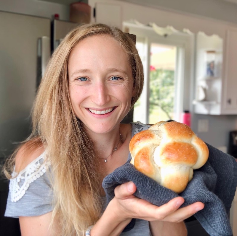Girl holding challah bread
