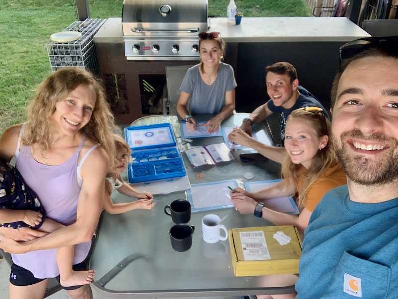 Young adults playing Spirograph