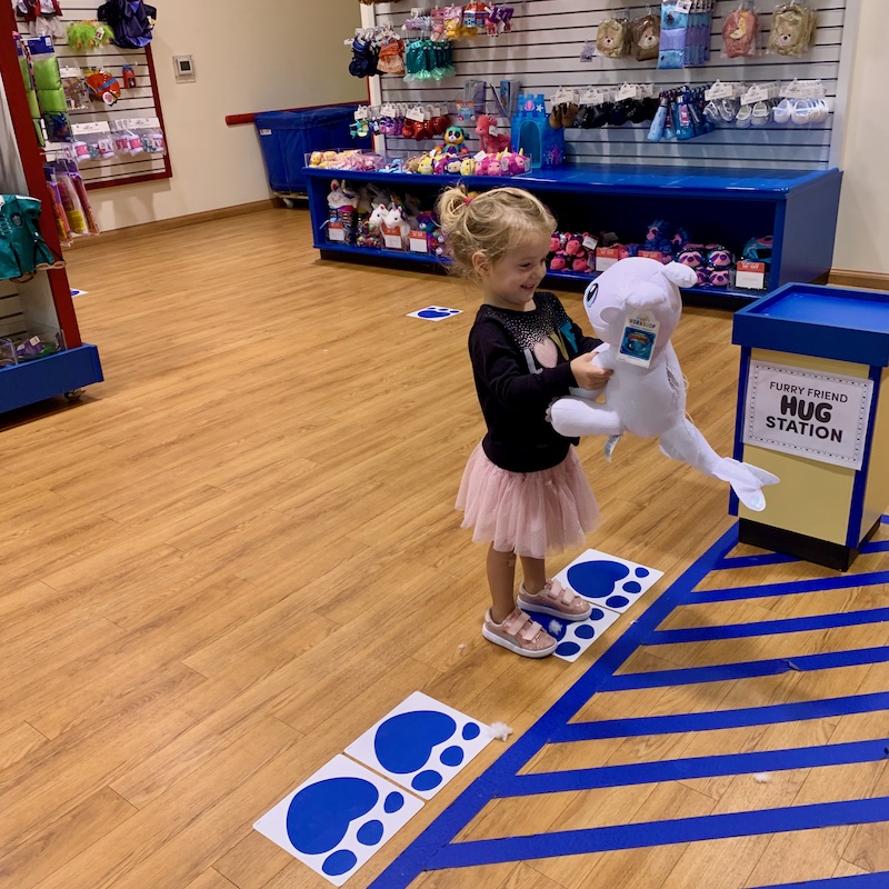 Toddler girl at Build a Bear