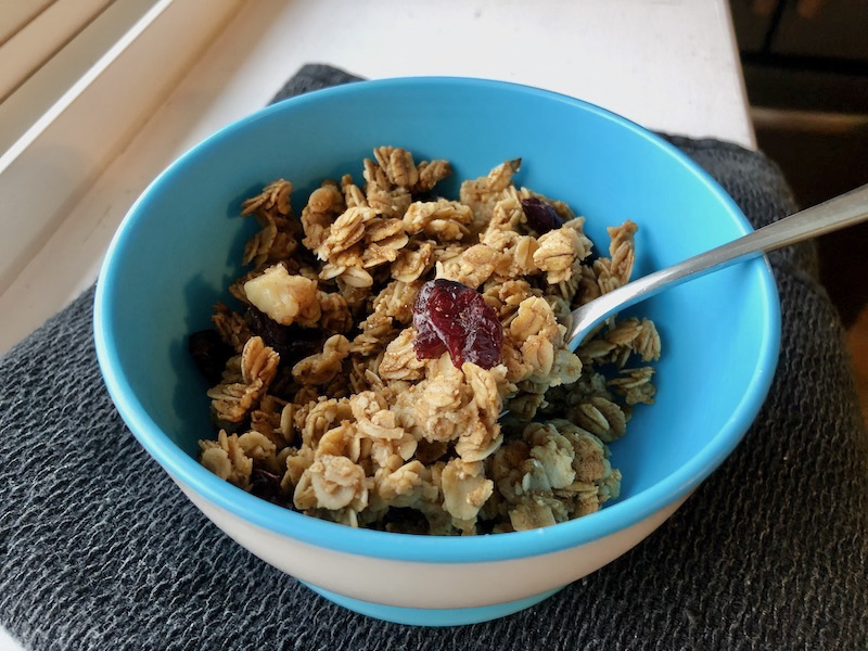 Gingerbread Granola in bowl with spoon