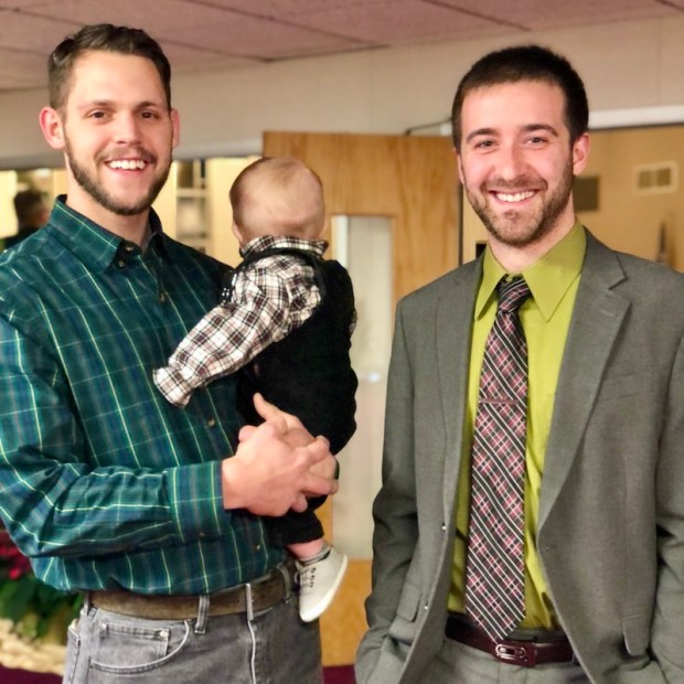 Guys at church with baby