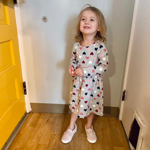 Toddler girl wearing heart dress