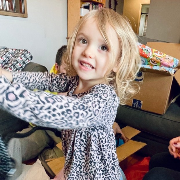 Toddler girl wearing leopard shirt