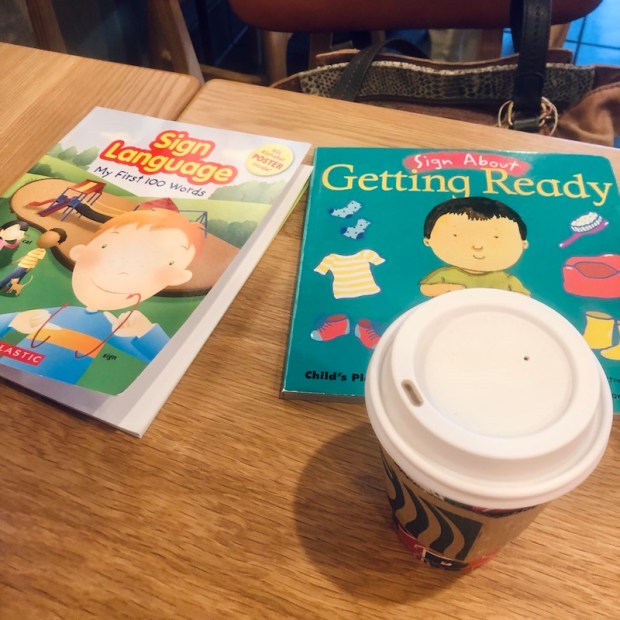 Sign language books for children and Starbucks coffee