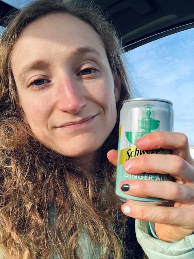 Girl drinking ginger ale for morning sickness