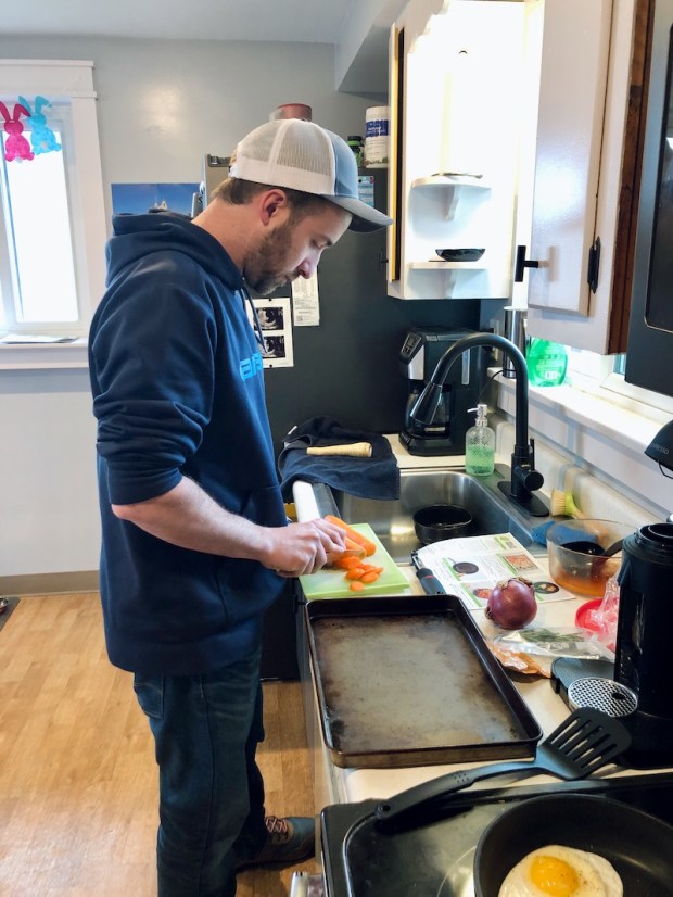 Guy cooking Hello Fresh meal
