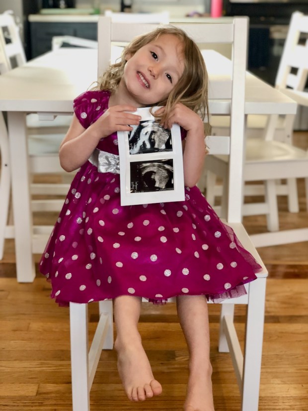 Toddler holding ultrasound