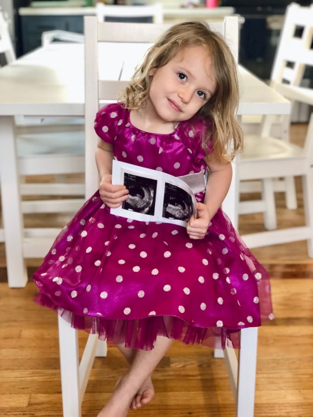 Toddler holding ultrasound