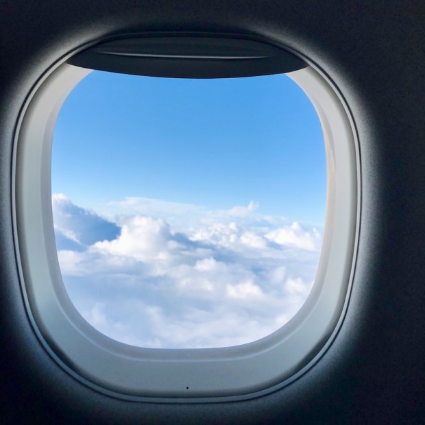 Airplane window on Breeze Airways flight