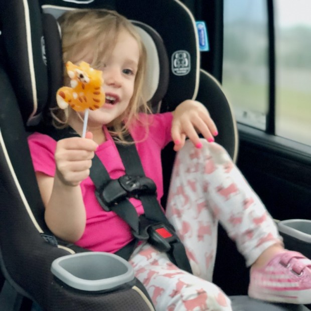 Toddler with cat lollipop from Sugar Kingdom