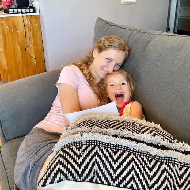 Mom and daughter snuggling